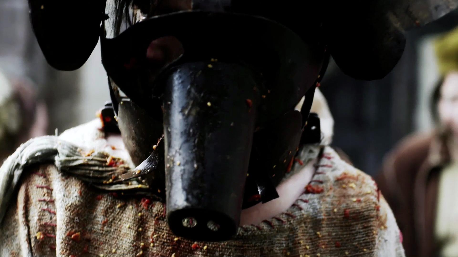 Schandmaskenträger im Mittelalter (Spielszene)