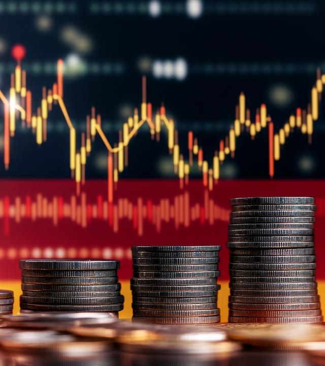 Geldmünzen und Kursverlauf Finanzmarkt