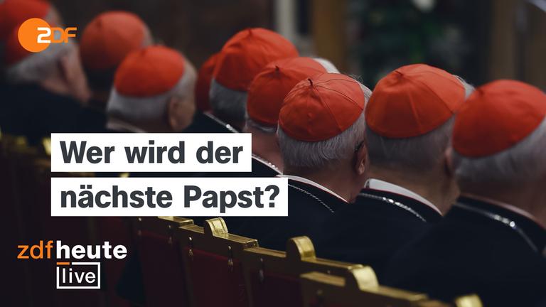 Mehrere Hinterköpfe mit roten Kappen und der Aufschrift: Wer wird der nächste Papst?