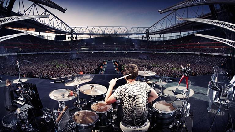 Die Band Muse bei ihrem Auftritt in Rom.