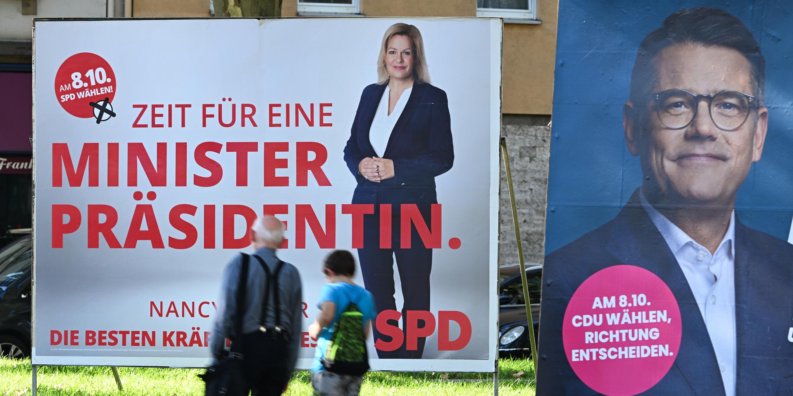 Wahlplakate der Spitzenkandidaten von SPD und CDU in Hessen