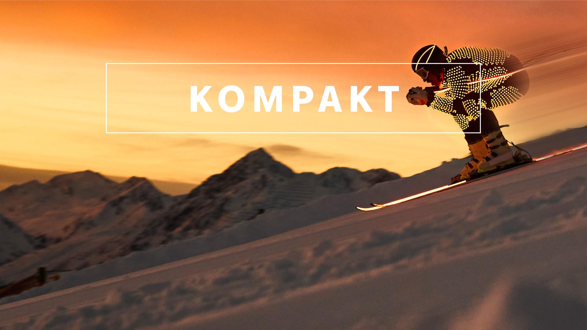Das Wintersport "KOMPAKT"- Logo vor Bergkulisse mit einem Alpin-Skifahrer