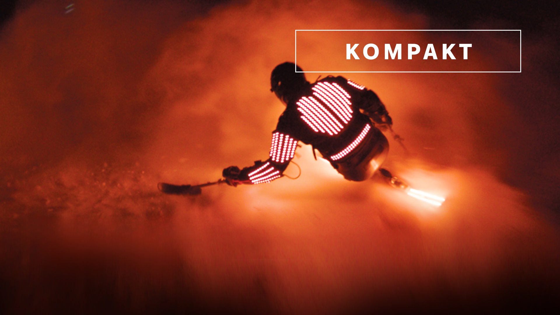 Wintersport "KOMPAKT"- Logo vor Monoskifahrer