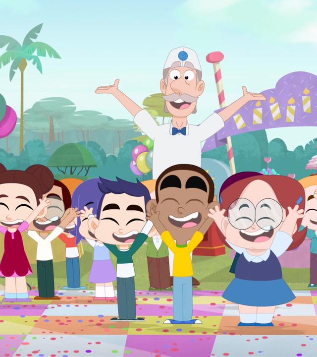 Eine Gruppe von Kindern, Rebeccas Freunde, stehen mit ausgebreiteten Armen und fröhlichen Mienen auf einem bunten, mit Konfetti übersähten Boden im Garten. Alles ist für eine Party dekoriert.