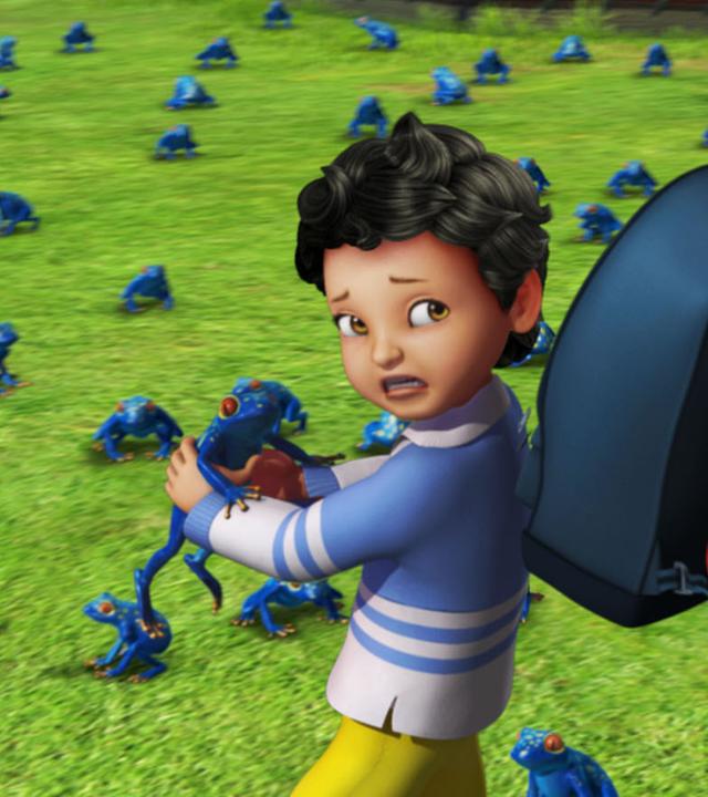 John und Michael versuchen sich vor den Fröschen in Sicherheit zu bringen. John zieht bereits den Kopf ein, während Michael mit einem Frosch in den Händen ringt.