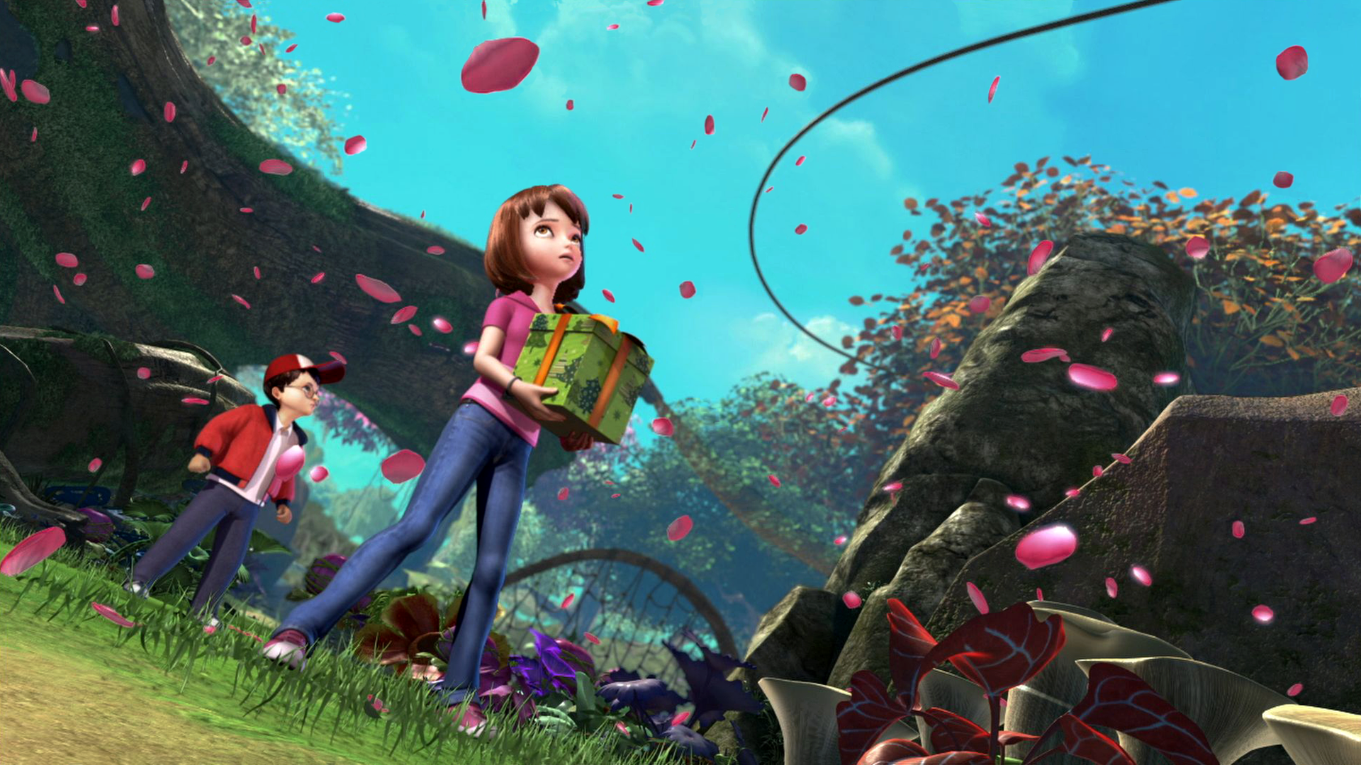 Wendy trägt mit beiden Armen ein grün verpacktes Geschenk. Sie blickt besorgt nach oben, von wo rosafarbene Blütenblätter herabfallen. Michael, der hinter Wendy steht, tut das selbe.