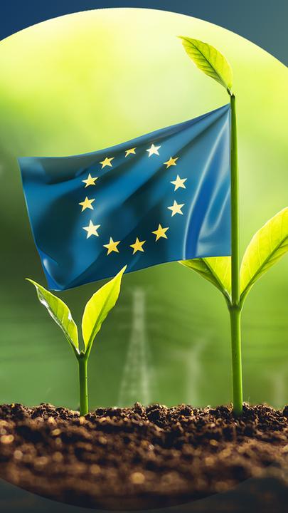 EU Flagge mit Winderädern im Hintergrund