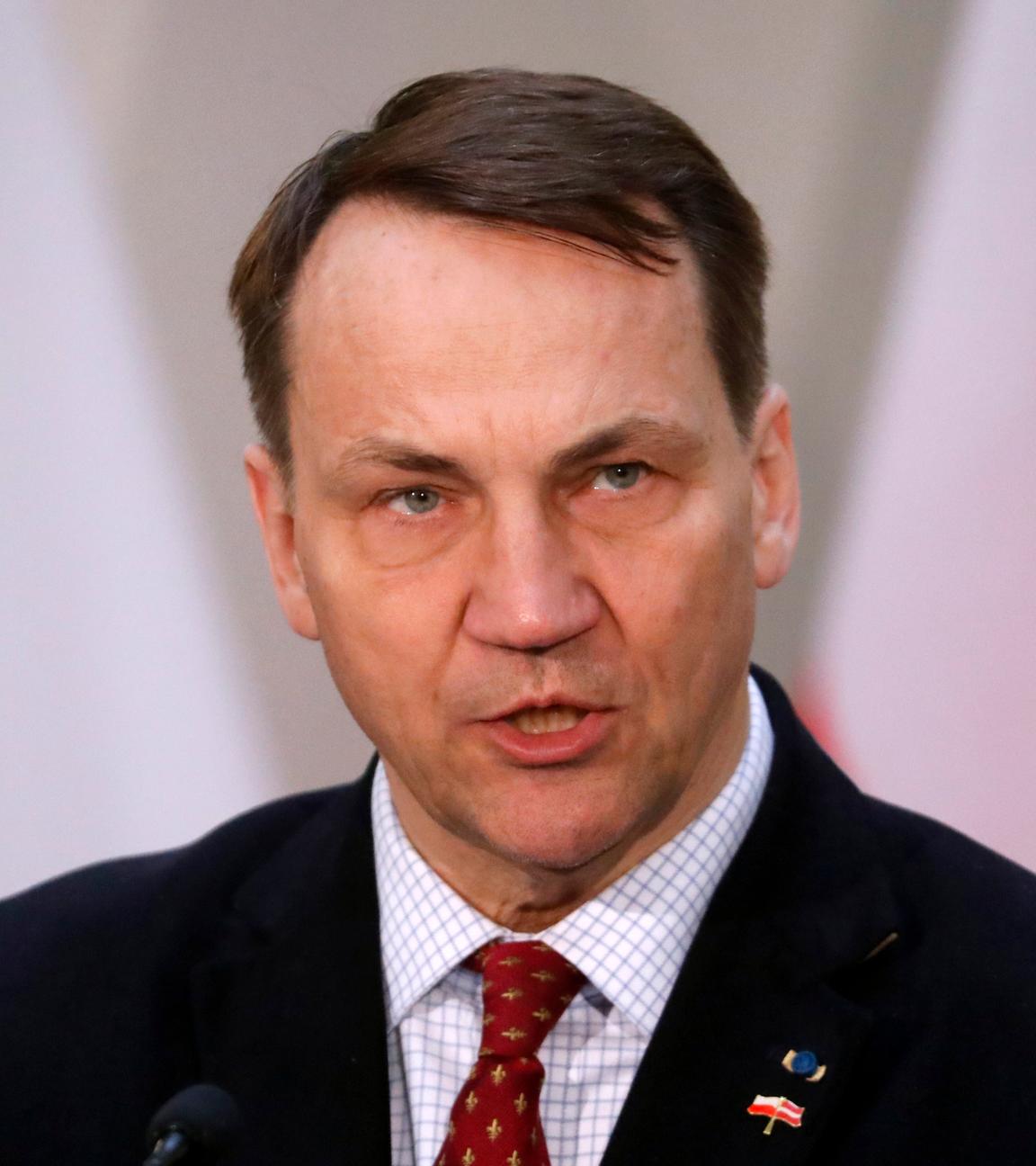 Poland's Foreign Minister Radoslaw Sikorski attends a joint press conference with his Latvian counterpart after their meeting in Riga, Latvian, 27 March 2024.