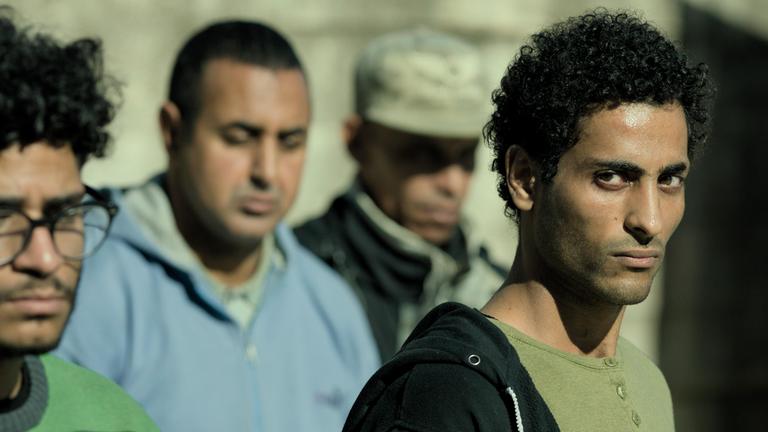 "Sharaf": Szenenfoto mit Ahmed Al Munirawi (re.) als Sharaf