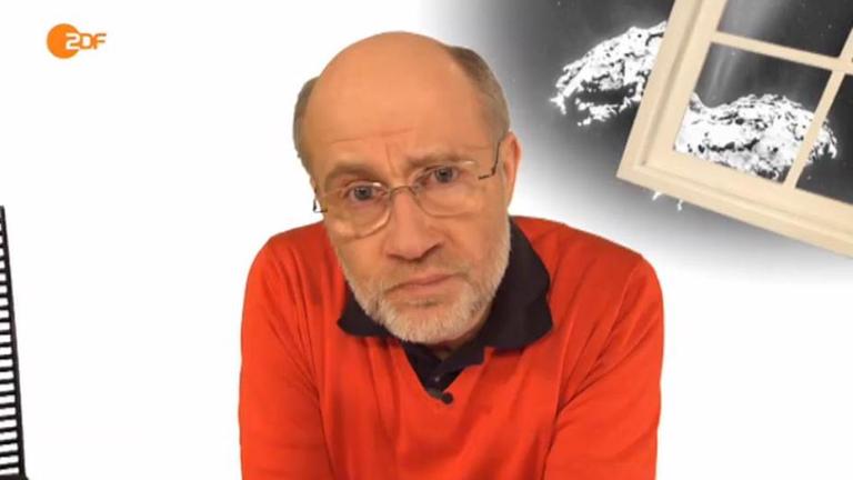 Prof. Harald Lesch im Studio mit Komet "Tschuri" im Hintergrund