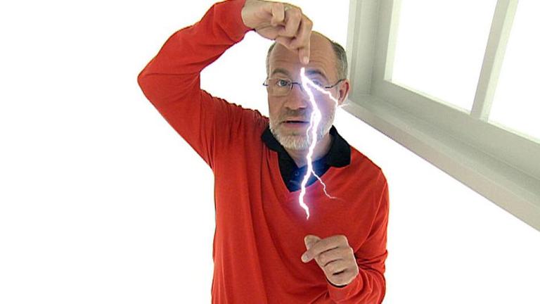 Prof. Harald Lesch mit einem Lichtblitz