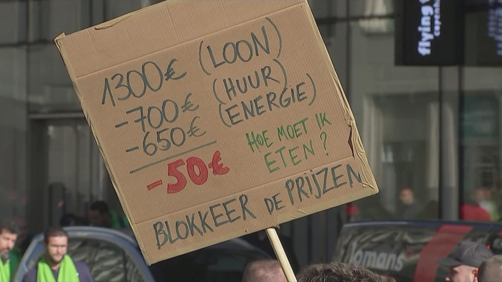 Plakat auf einer Demo in Brüssel