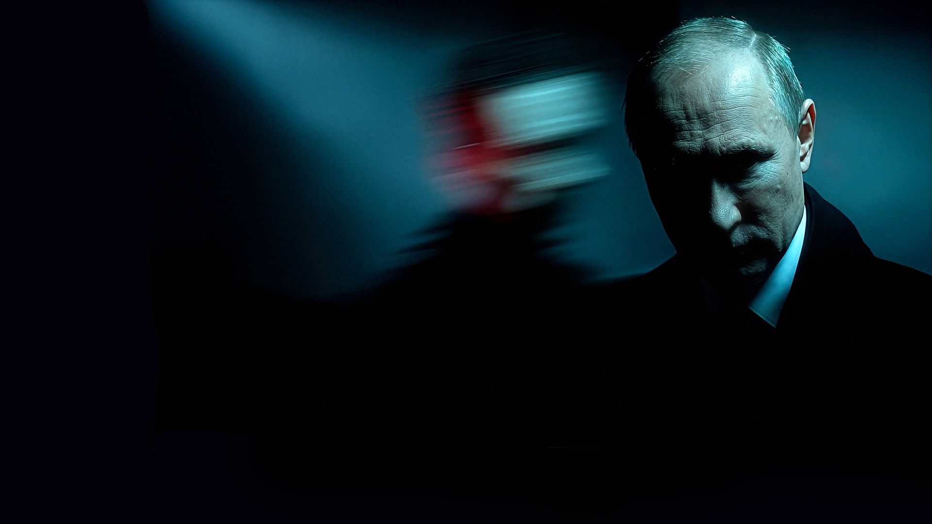 Putin mit einem Schatten im Hintergrund