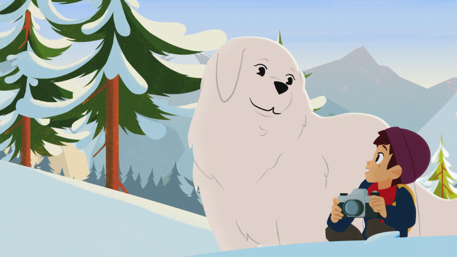 Belle und Sebastian sind in den schneebedeckten Bergen. Sebastian kniet und schaut Belle an. Er hält Césars Fotoapparat mit beiden Händen.
