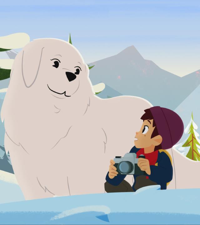 Belle und Sebastian sind in den schneebedeckten Bergen. Sebastian kniet und schaut Belle an. Er hält Césars Fotoapparat mit beiden Händen.