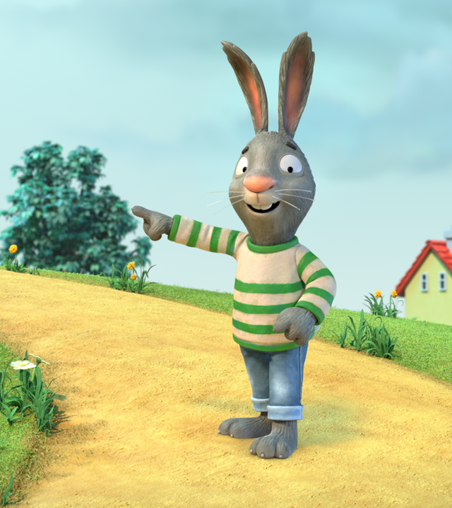 Pip, das Kaninchen zeigt mit ausgestrecktem Arm auf einen Punkt am Ende des Weges, von dem er denkt, dass dort das Ende des leuchtenden Regenbogens ist.