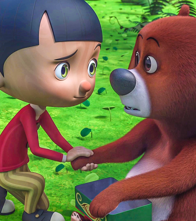 Betulla steht neben Pinocchio, der die Pfote des Zirkusbären Bibou hält.