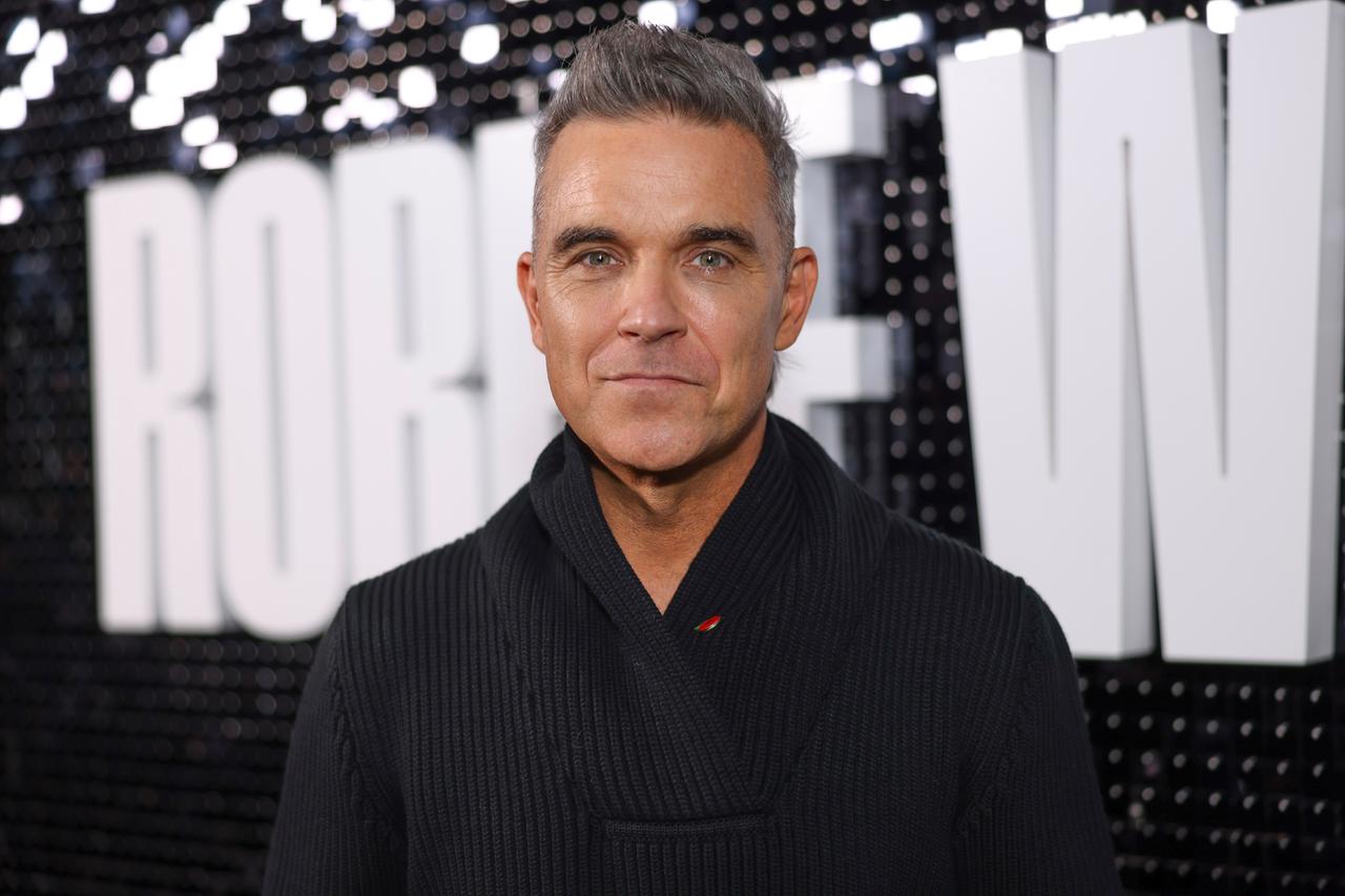 Großbritannien, London: Robbie Williams, Sänger aus Großbritannien, kommt zur Premiere der Robbie-Williams-Dokumentation.