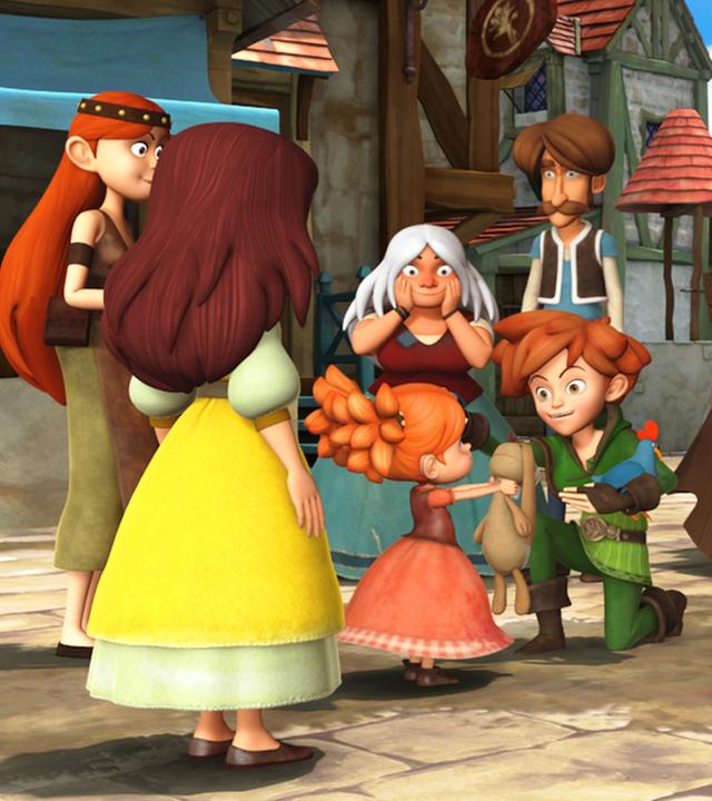 Robin kniet vor einem kleinen Mädchen. Umringt von anderen Kindern und Bewohnern Nottinghams will er den Waisenkindern seine Spenden geben.