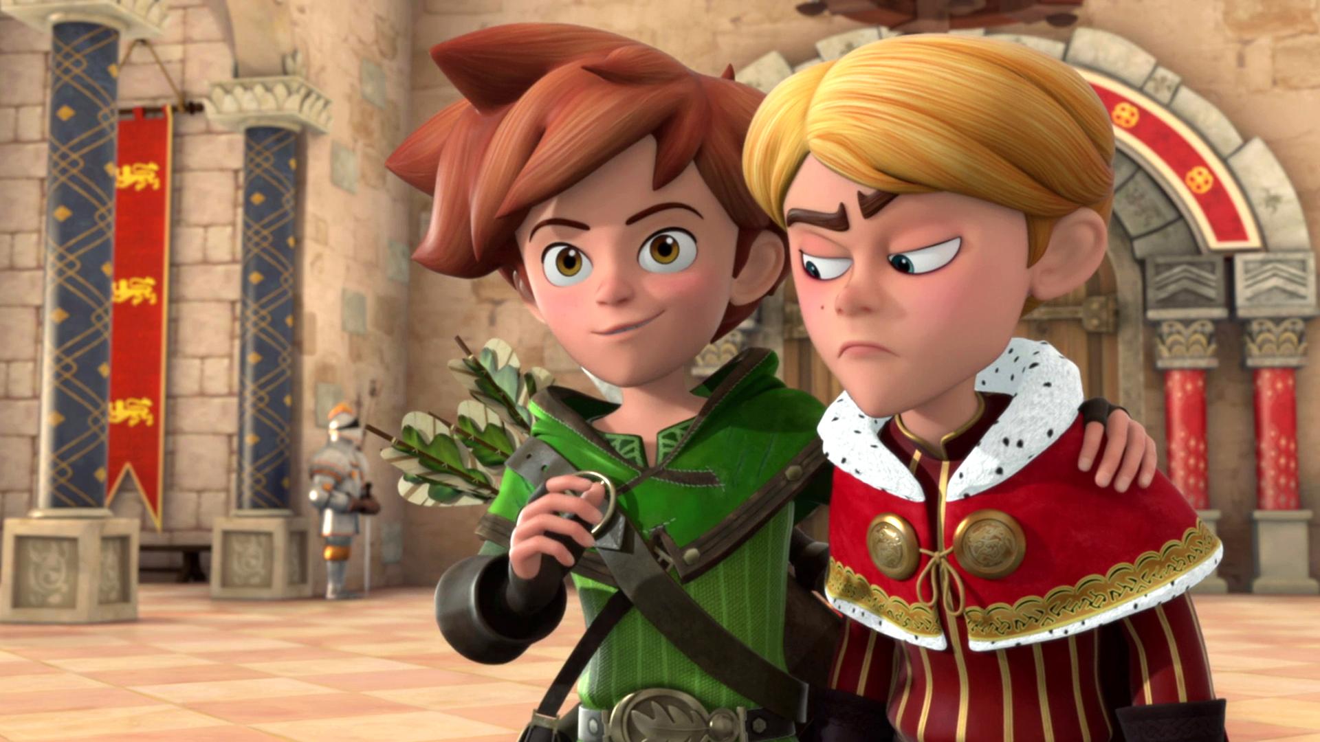 Robin legt einem grimmig aussehnden Prinz John seinen Arm um die Schulter. Die beiden stehen im Schloss.