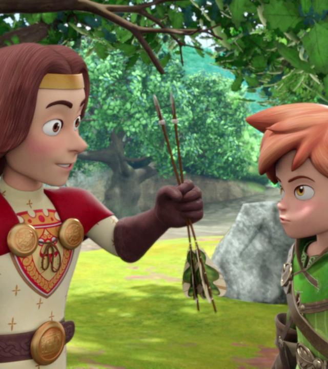 König Richard und Robin Hood stehen im Wald. König Richard trägt einen Helm unter seinem Arm und streckt Robin Hood zwei Pfeile entgegen.