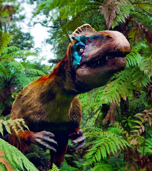 Ein Cryolophosaurus bewegt sich durch den Dschungel