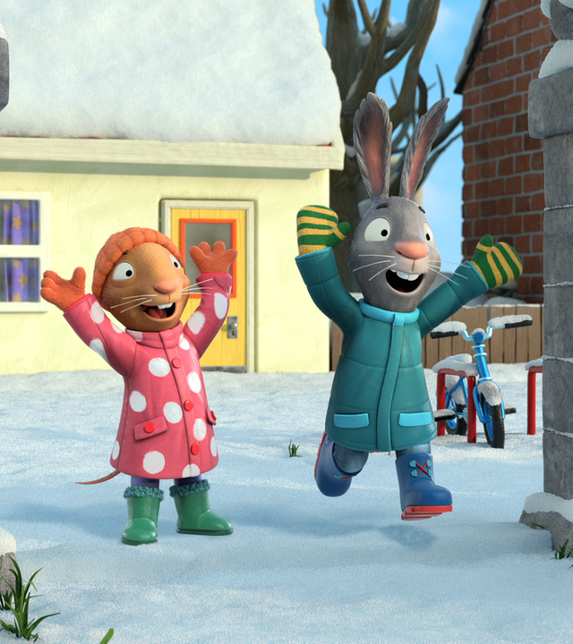 Posy und Pip freuen sich über den Schnee.