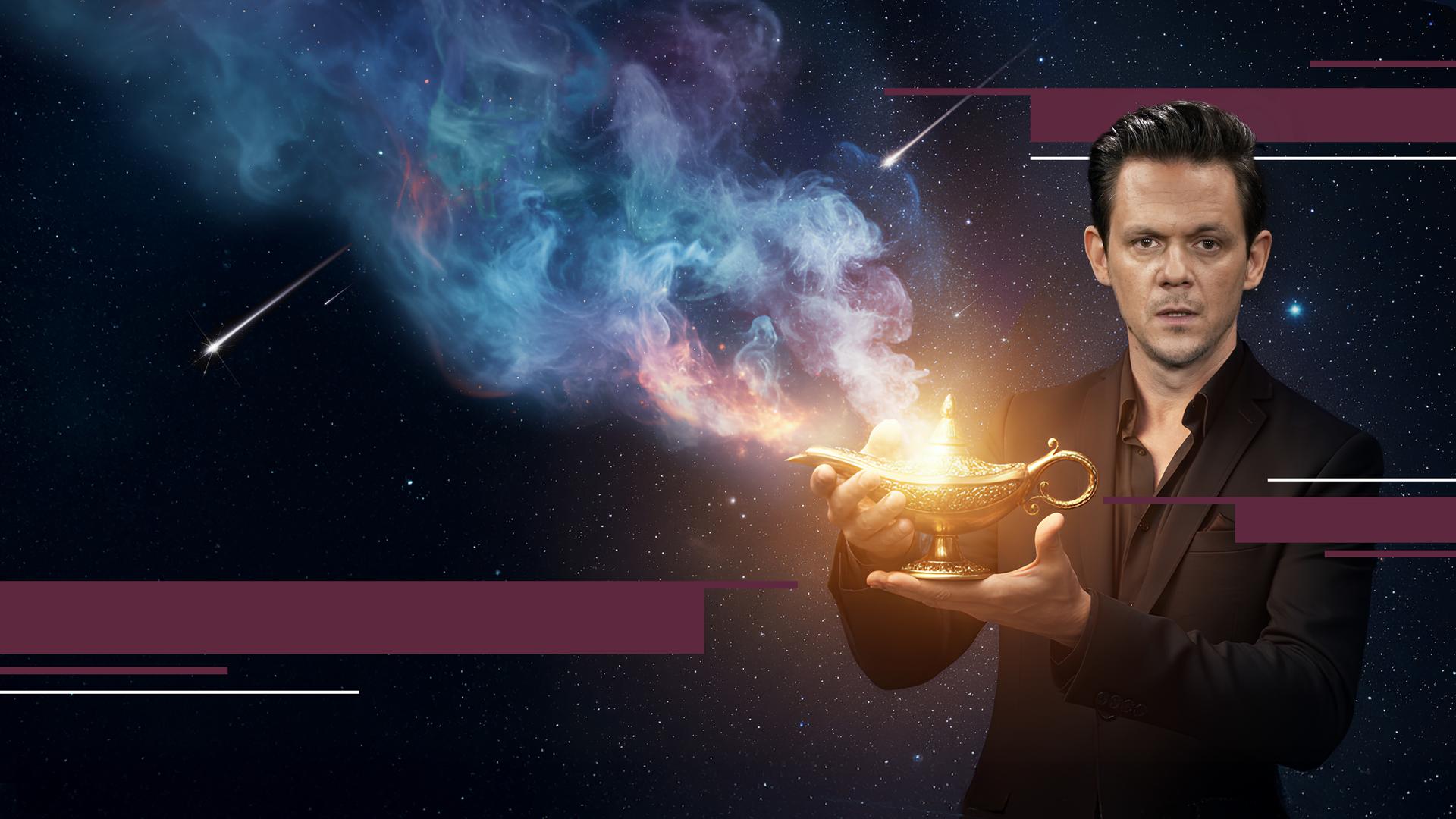 Moderator Jo Schück mit Wunderlampe und Sternschnuppen im Hintergrund.