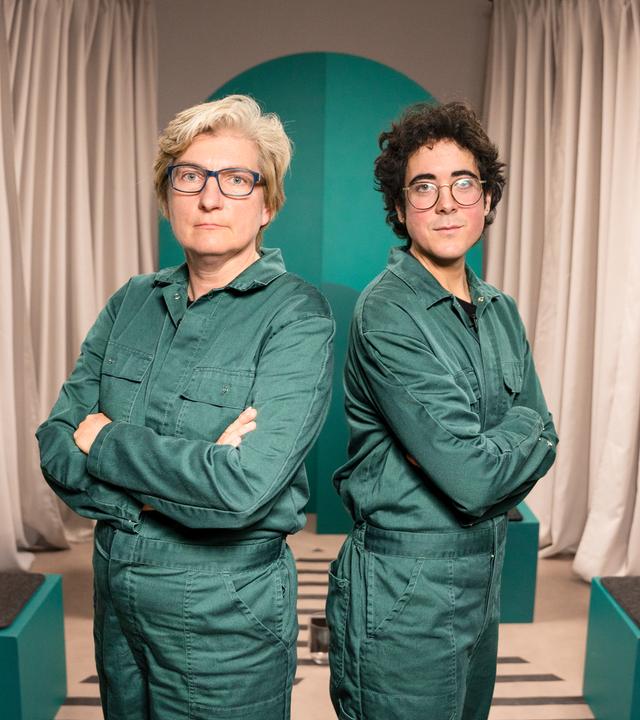 Die beiden Gäste im grünen Overall.