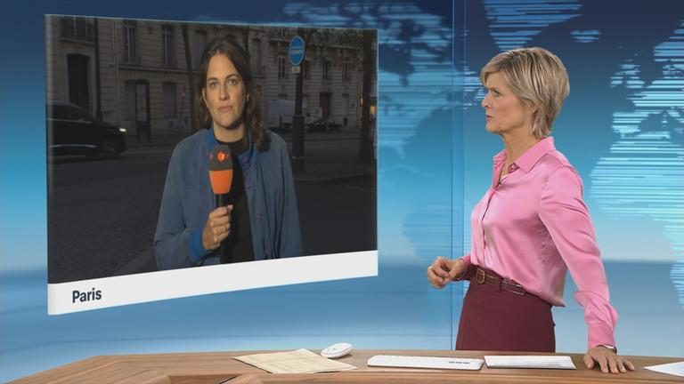 Schaltgespräch mit ZDF-Korrespondentin Anna Warsberg und Moderation.