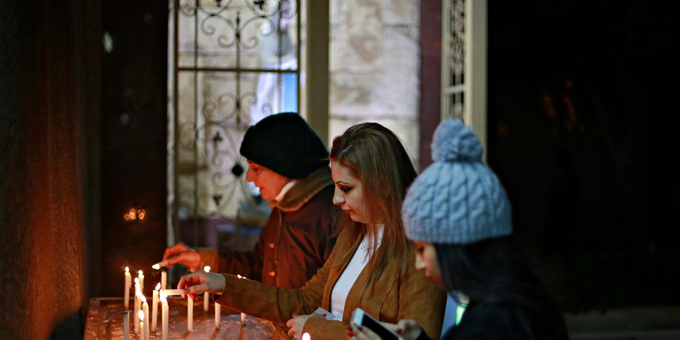 Irak: Kerzen nach der Messe