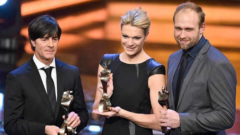Joachim Löw (l-r), Maria Höfl-Riesch und Robert Harting