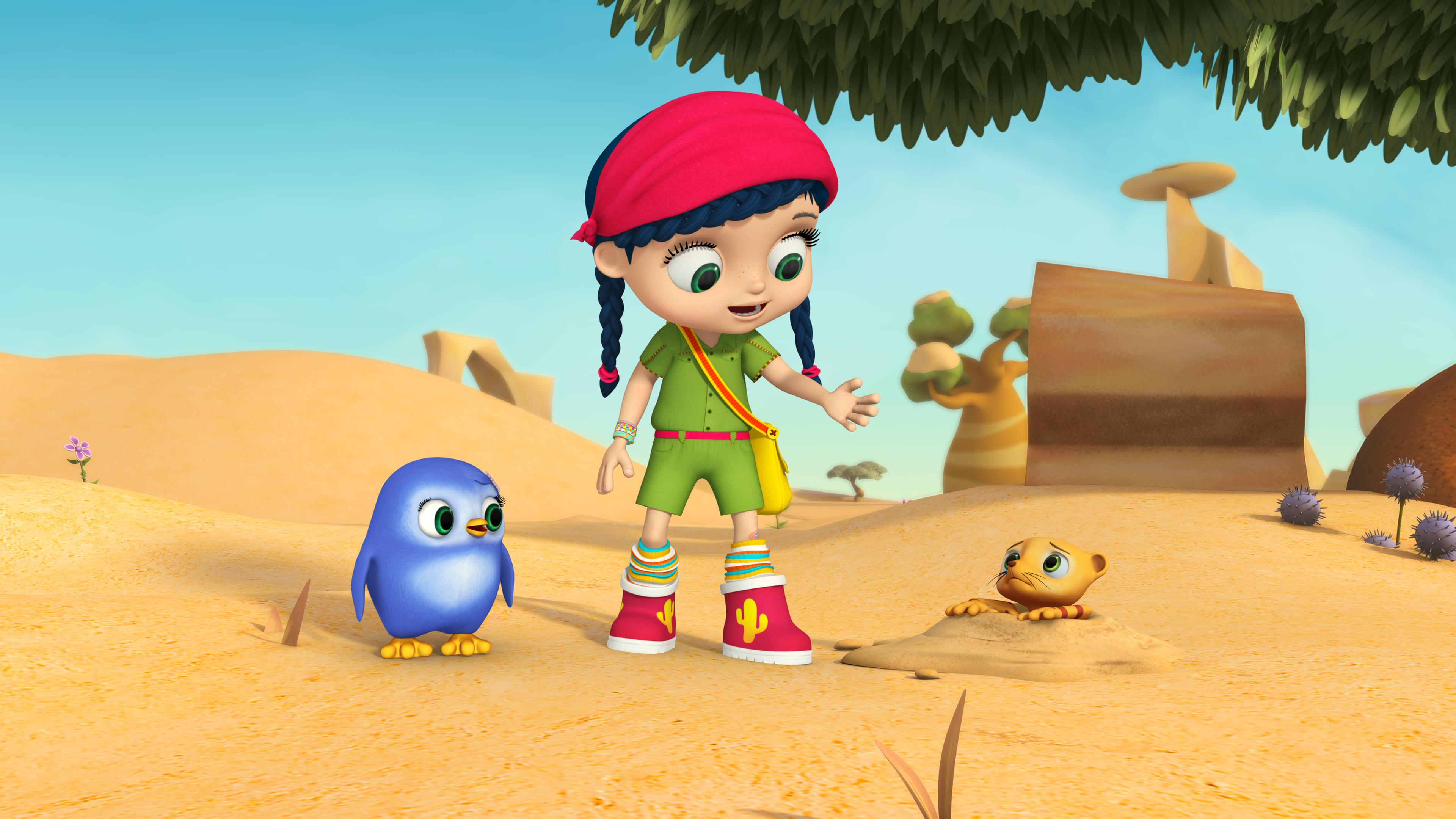 Wisser (Mitte) und Pinguinmädchen Peggy (links) schauen nach rechts zu einem Erdmännchen, das den Kopf aus seinem Erdloch herausstreckt.