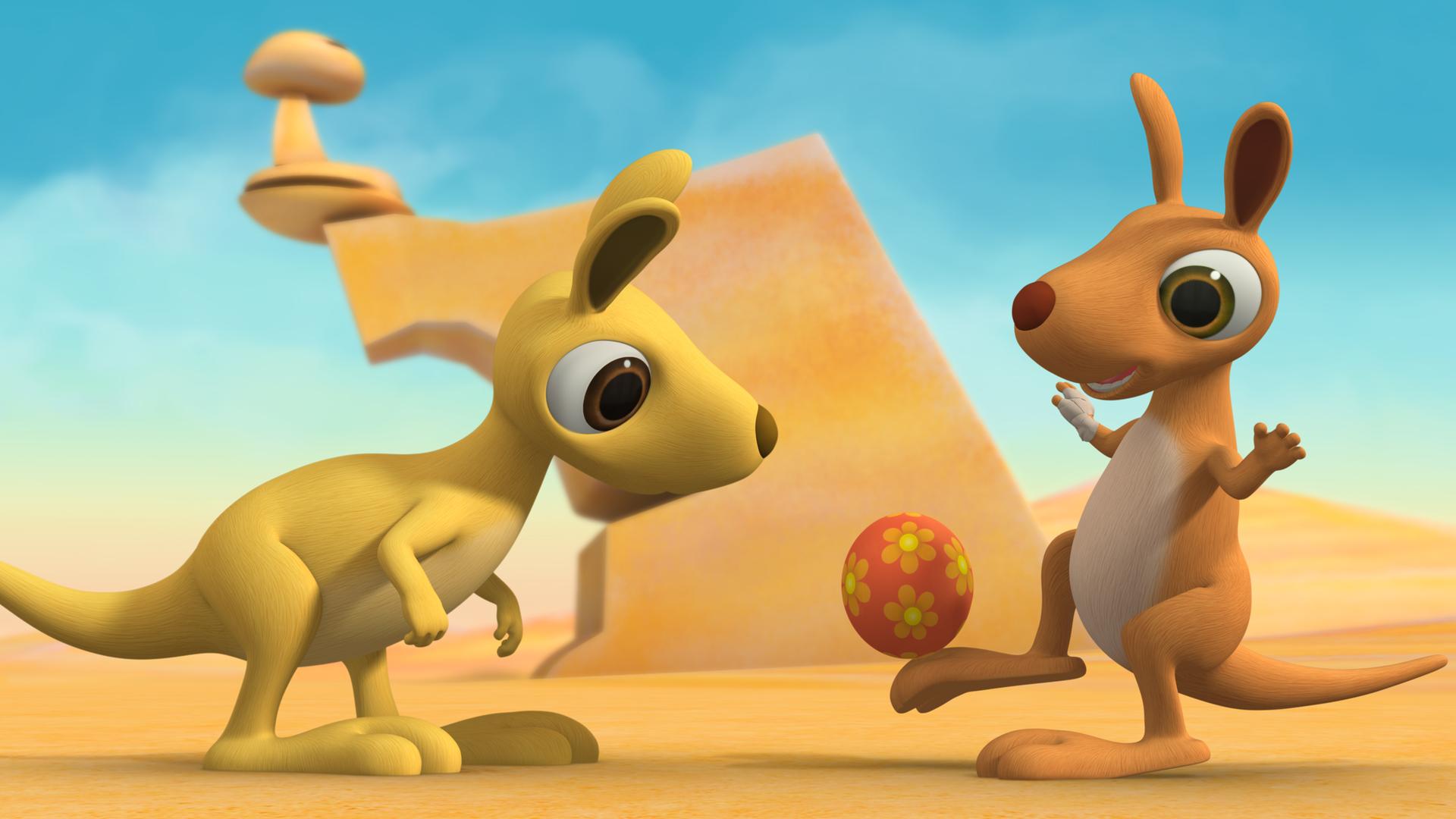 Die Känguru-Geschwister Karli und Klara vertragen sich wieder. Klara spielt mit einem roten Ball.