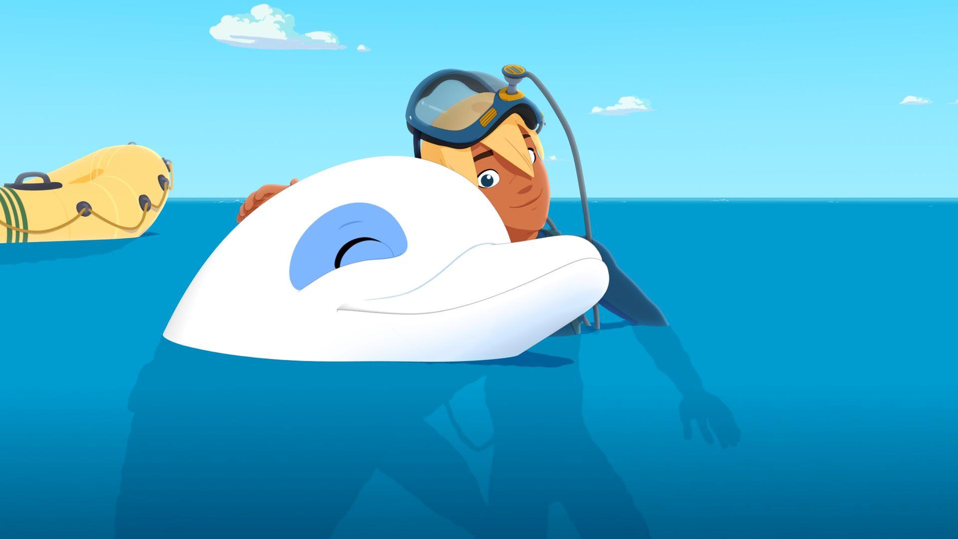 Yann umarmt Zoom im Wasser und ist glücklich.