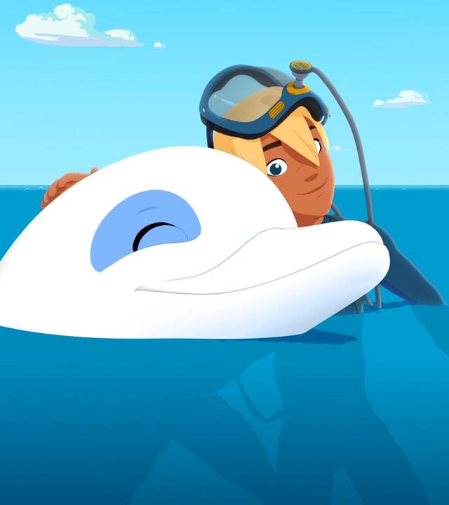 Yann umarmt Zoom im Wasser und ist glücklich.