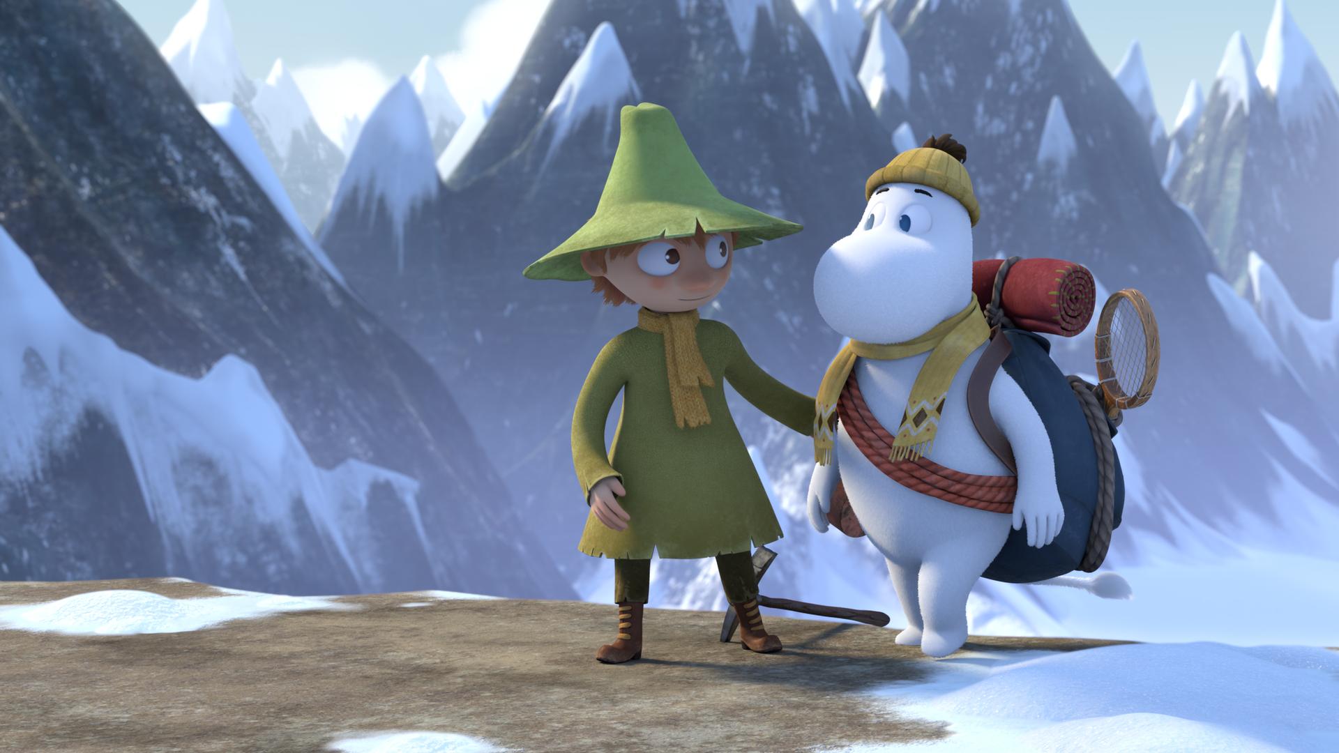 Überall sind schneebedeckte Gipfel. Mumintroll (rechts) steht mit voller Bergsteigerausrüstung an einer Felskante, wo ihn Snufkin (links) empfängt. Die beiden schauen sich ernst an.
