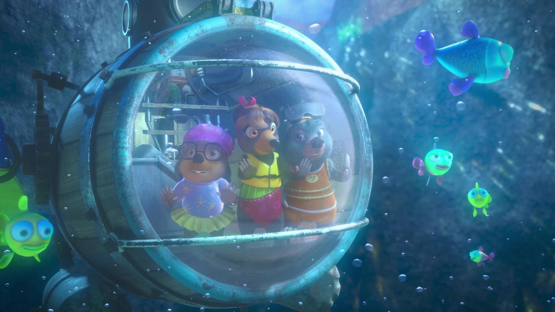 An der großen Frontscheibe eines kleinen U-Bootes stehen Dotty, Mona Lisa und Moley und betrachten fasziniert die Unterwasserwelt mit vielen leuchtenden Fischen.