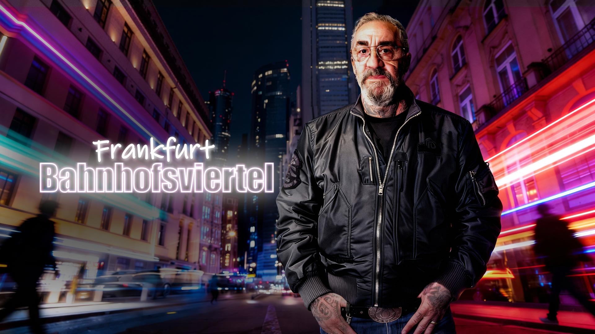 Streetworker Roberto Carelli mit verschränkten Armen vor dem Nachtbus und der Drogenhilfe "Eastside"