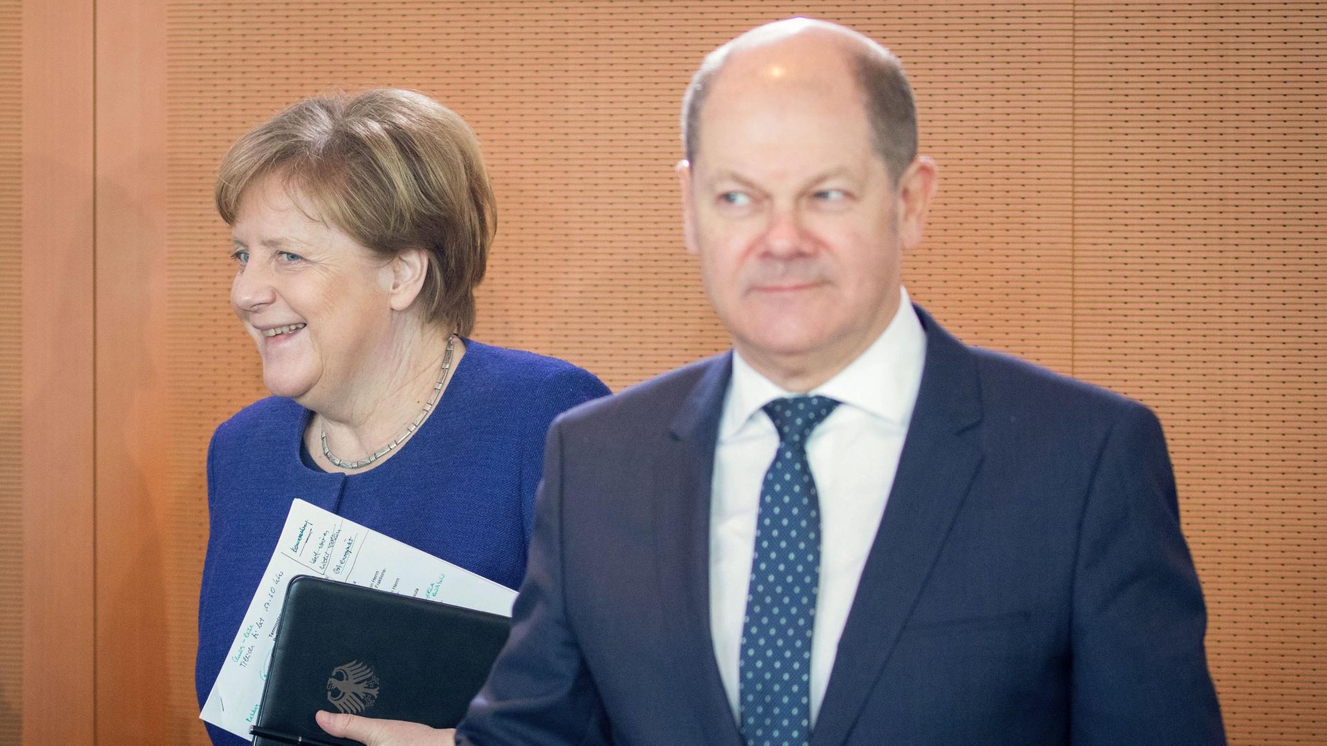 Kanzlerin Merkel (CDU) und Finanzminister Scholz (SPD).