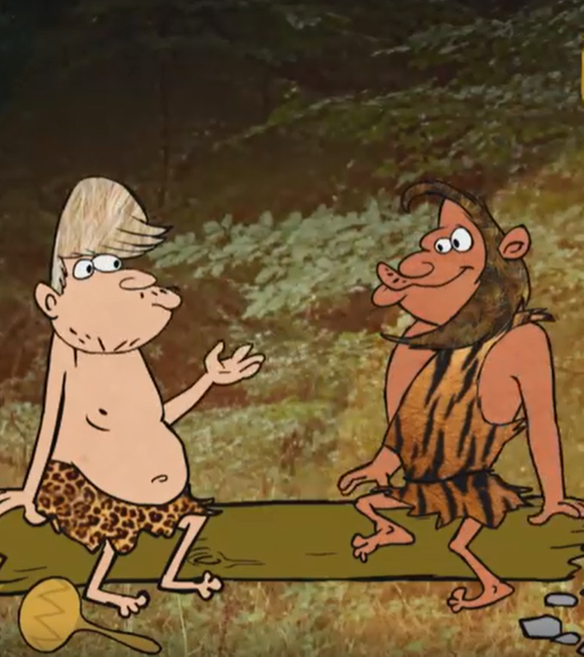 Höhlenmenschen die zusammen am Feuer sitzen