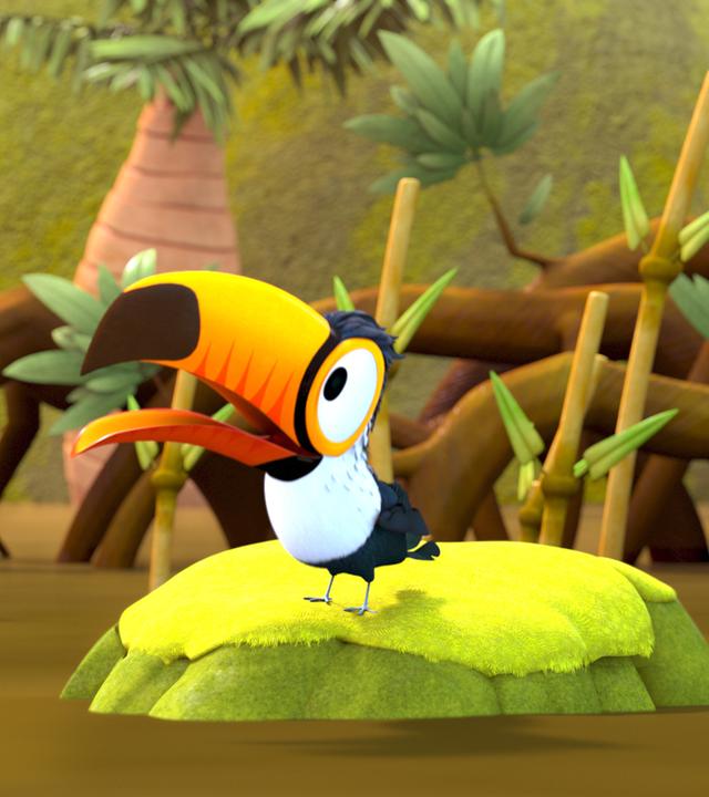 Tukan Toni steht auf einer kleinen grünen Insel mitten im Sumpf. Im Hintergrund Mangrovenbäume.