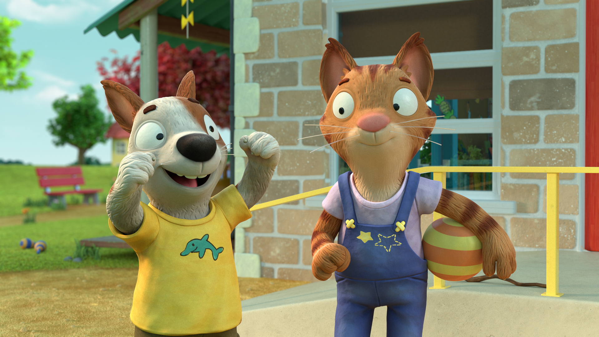 Zac und Frankie stehen nebeneinander. Frankie hält den Fußball unter ihrem Arm, Zac wirft die Arme in die Luft.