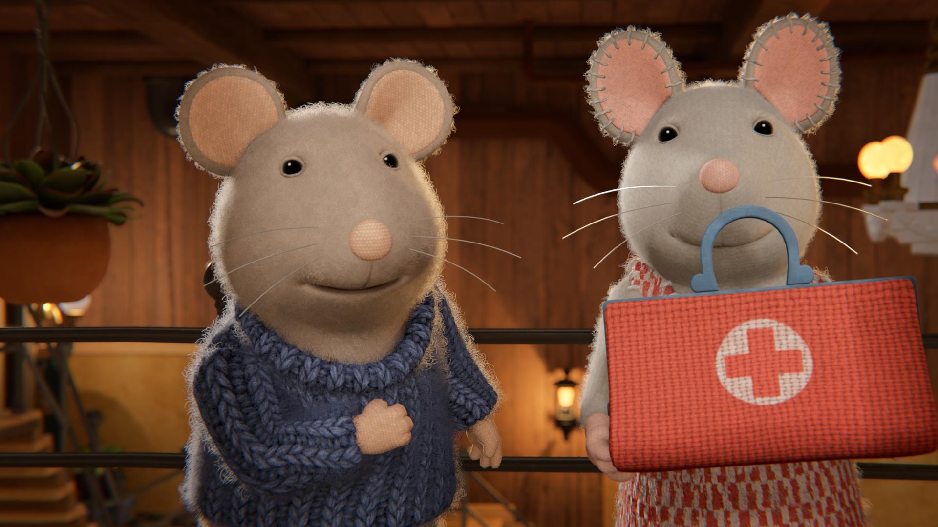 Sam und Julia stehen nebeneinander im Treppenhaus. Julia hat einen Arztkoffer mit einem roten Kreuz darauf in den Händen. Beide schauen freundlich nach vorne.