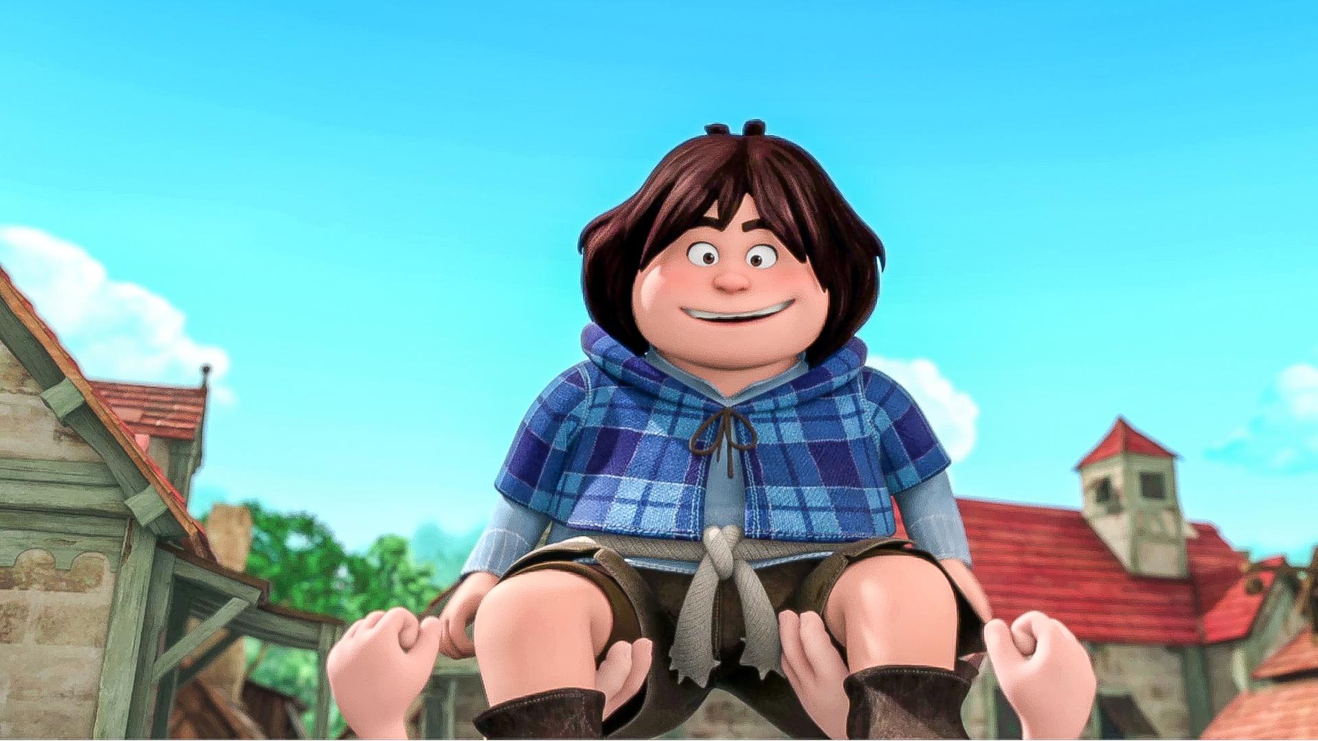 Tuck wird auf Händen getragen. Er sieht glücklich aus.