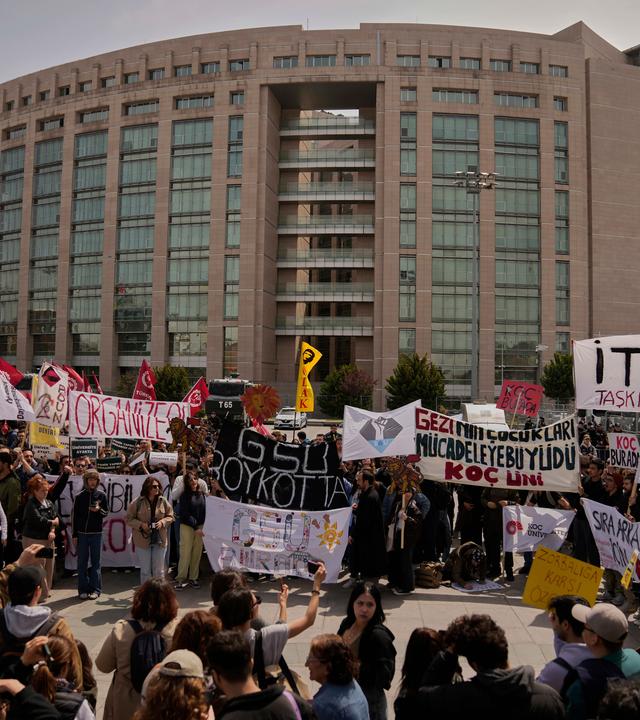 People gather to protest outside Caglayan courthouse, in Istanbul, Turkey.