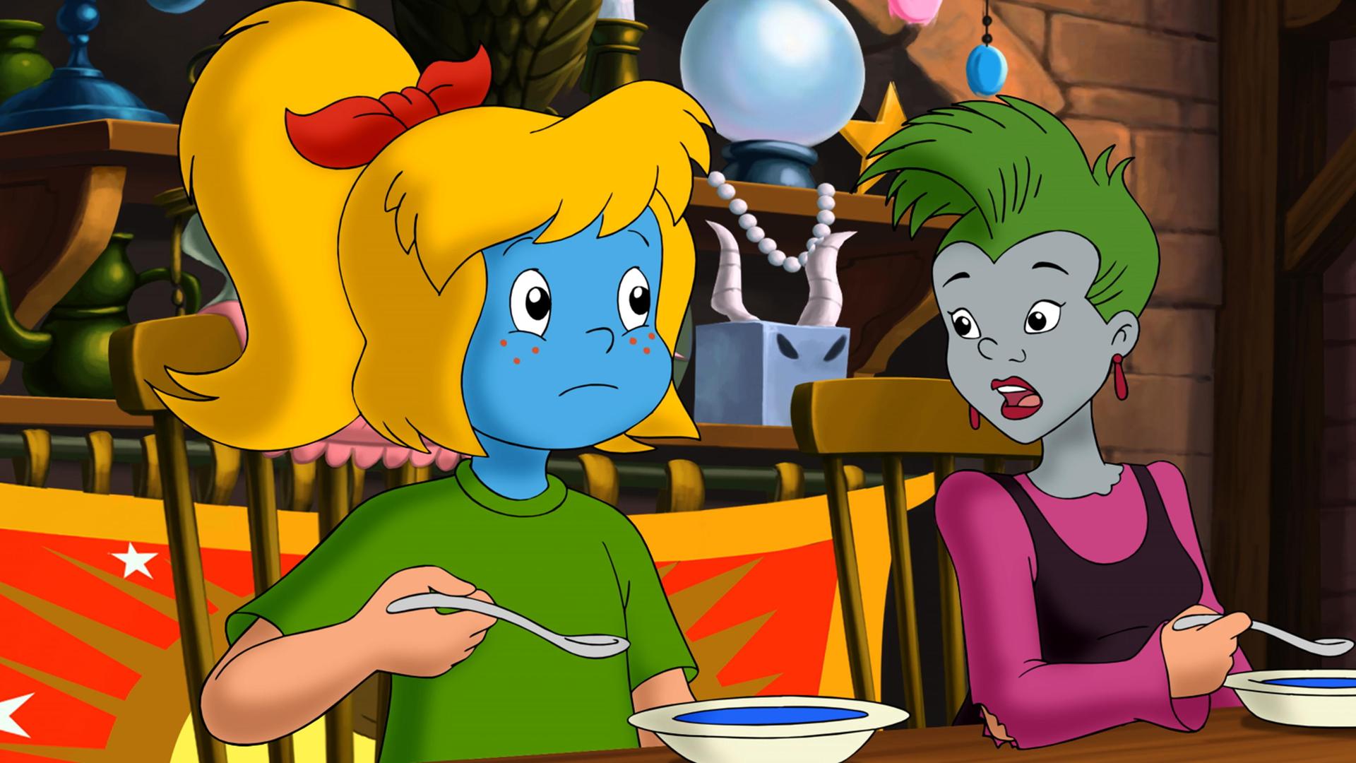 Bibi Blocksberg und Schubia werden beim Essen der Suppe ganz blau im Gesicht.