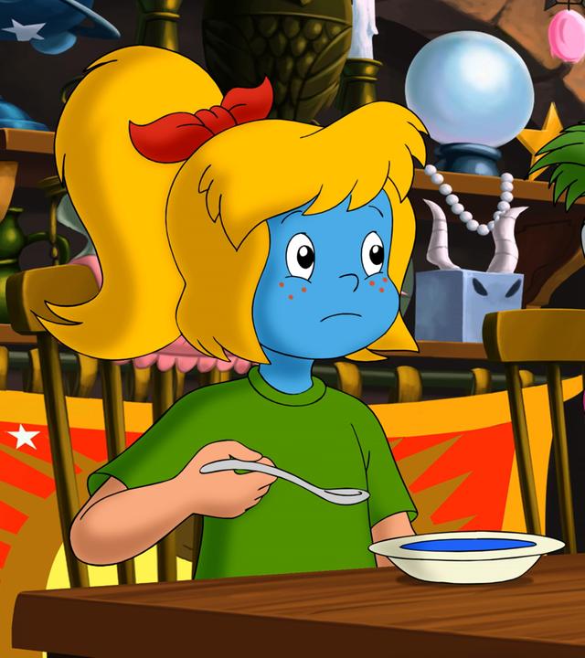 Bibi Blocksberg und Schubia werden beim Essen der Suppe ganz blau im Gesicht.