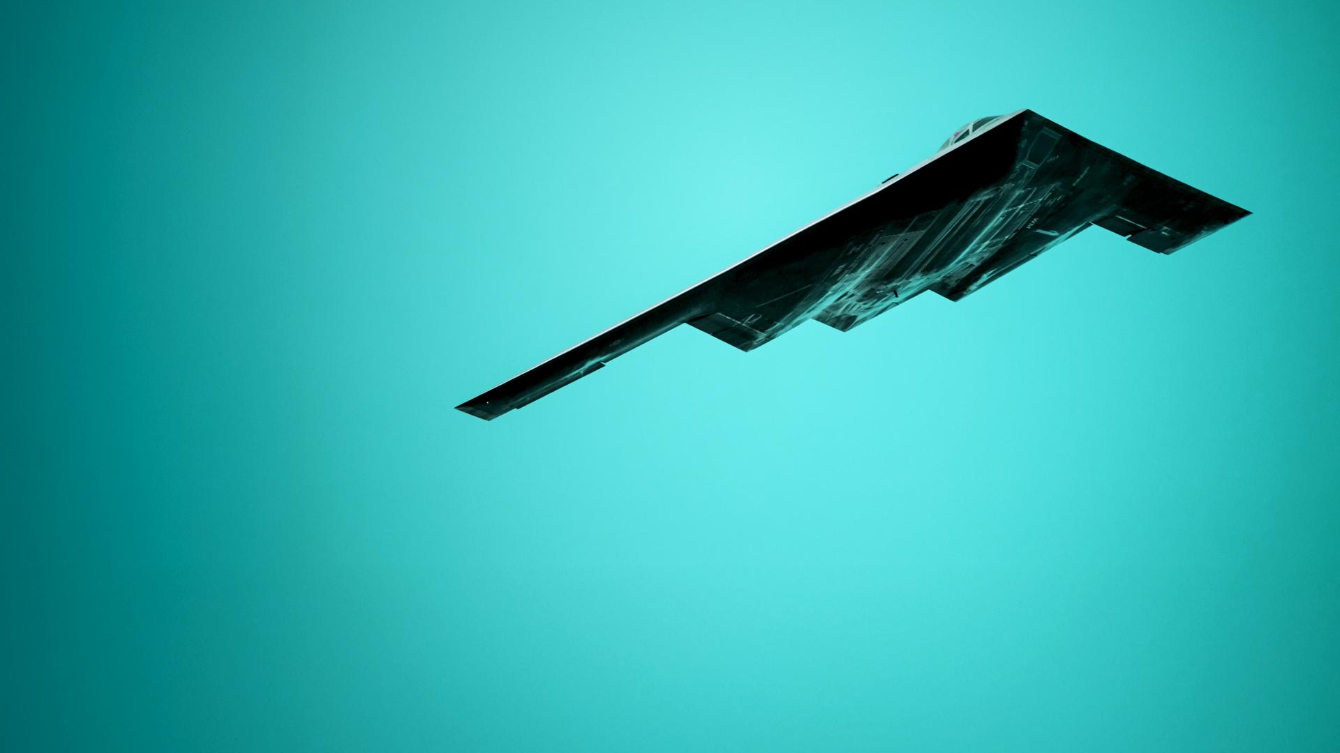 Ein B2 Stealth Bomber in der Luft, Ansicht von schräg unten