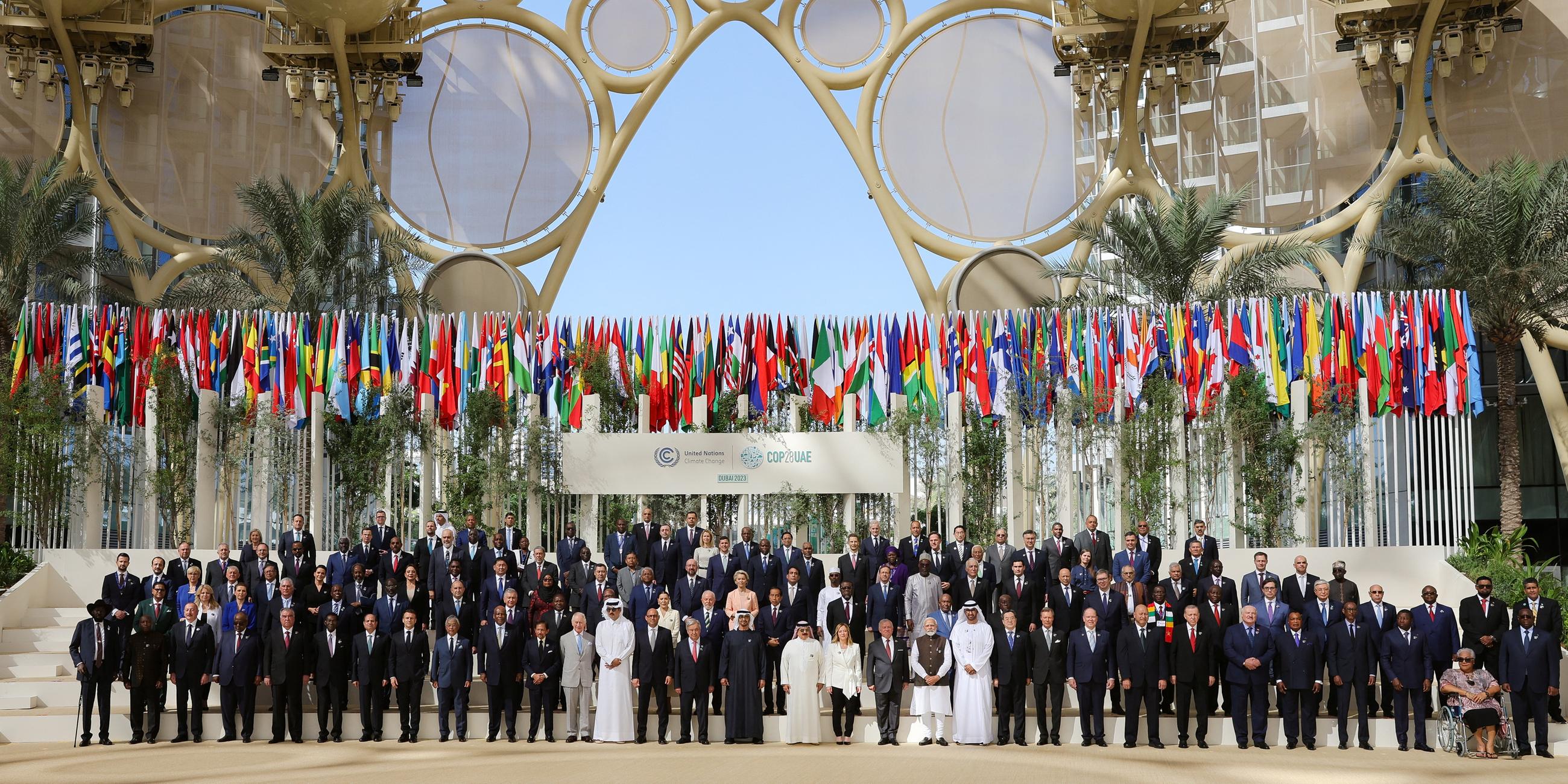 World leaders pose for a group photo during the United Nations Climate Change Conference (COP28), in Dubai, United Arab Emirates, December 1, 2023.